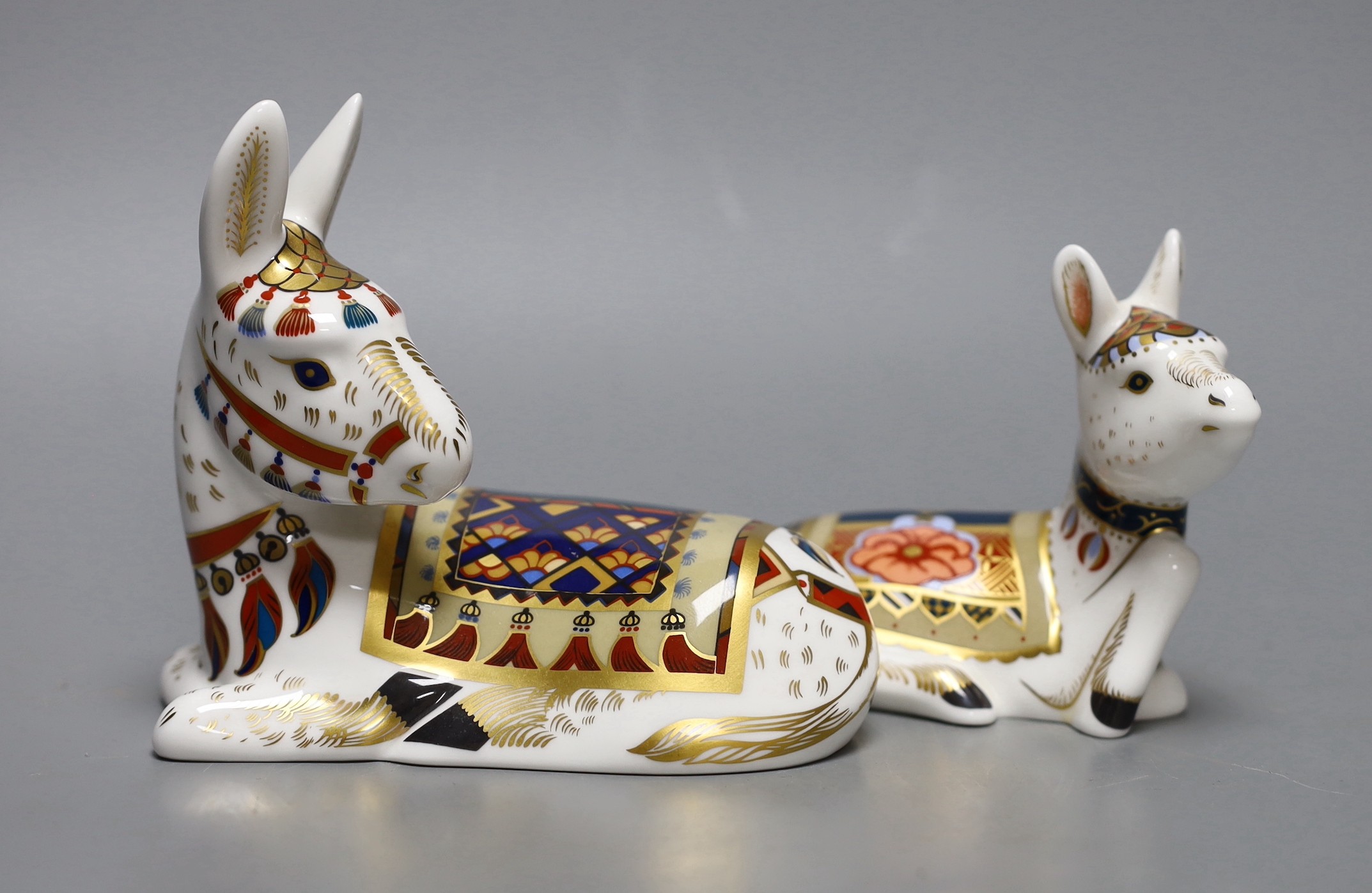 Two Royal Crown Derby paperweights - Donkey and Donkey Foal, both with gold stoppers and boxes, no certificates
